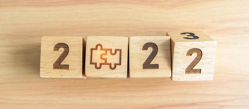 2022 change to 2023 block with jigsaw puzzle icon. Business Process, Team, teamwork, Goal, mission, Resolution, strategy, plan, Action, partnership, cooperation , brainstorm and New Year start photo