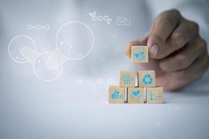 Technology, hand holding with environment Icons over the Network connection. photo