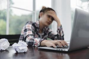 Sad and depressed woman in the deep thought in the office. stress, failure at work. photo