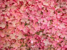 Close up fake rose leaf texture wallpaper background. photo