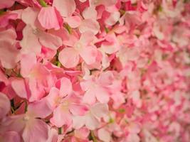 Close up fake rose leaf texture wallpaper background. photo