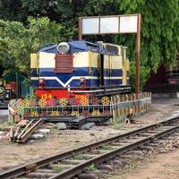 Kalka, Haryana, India May 14 2022 - Indian toy train diesel locomotive engine at Kalka railway station during the day time, Kalka Shimla toy train diesel locomotive engine photo