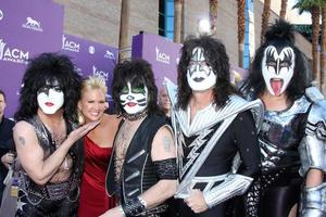 LAS VEGAS - APR 1 - KISS, Nancy O Dell arrives at the 2012 Academy of Country Music Awards at MGM Grand Garden Arena on April 1, 2010 in Las Vegas, NV photo