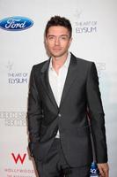 LOS ANGELES - JUN 9 - Topher Grace arriving at the Art of Elysium Return of Ford Mustang Boss Event at The Residences at W Hollywood on June 9, 2011 in Los Angeles, CA photo