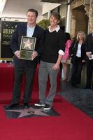 LOS ANGELES - FEB 14 - Alec Baldwin, Jack McBrayer at the Walk of Fame Star Ceremony for Alec Baldwin at Beso Resturant on February 14, 2011 in Los Angeles, CA photo