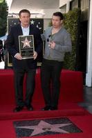 LOS ANGELES - FEB 14 - Alec Baldwin, Stephen Baldwin at the Walk of Fame Star Ceremony for Alec Baldwin at Beso Resturant on February 14, 2011 in Los Angeles, CA photo