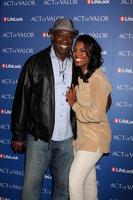 LOS ANGELES - FEB 13 - Michael Clarke Duncan, Omarosa Manigault-Stallworth arrives at the Act of Valor LA Premiere at the ArcLight Theaters on February 13, 2012 in Los Angeles, CA photo