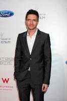 LOS ANGELES - JUN 9 - Topher Grace arriving at the Art of Elysium Return of Ford Mustang Boss Event at The Residences at W Hollywood on June 9, 2011 in Los Angeles, CA photo