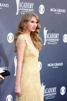 LAS VEGAS - APR 3 - Taylor Swift arriving at the Academy of Country Music Awards 2011 at MGM Grand Garden Arena on April 3, 2010 in Las Vegas, NV photo