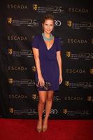 los angeles - 14 de enero - claire holt llega a la fiesta del té de la temporada de premios bafta 2012 en el hotel four seaons el 14 de enero de 2012 en beverly hills, ca foto