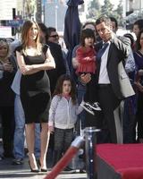 LOS ANGELES - FEB 1 - Adam Sandler, with daughters Sunny and Sadie at the Adam Sandler Hollywood Walk of Fame Star Ceremony at W Hotel on February 1, 2011 in Hollywood, CA photo