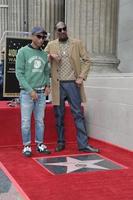 los angeles - 19 de noviembre - pharrell williams, snoop dogg, calvin broadus jr en la ceremonia estelar de snoop dogg en el paseo de la fama de hollywood el 19 de noviembre de 2018 en los angeles, ca foto