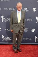 LAS VEGAS - APR 3 - Donald Rumsfeld arriving at the Academy of Country Music Awards 2011 at MGM Grand Garden Arena on April 3, 2010 in Las Vegas, NV photo