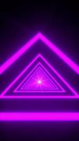 Moving forward through an endless futuristic triangular tunnel. Futuristic and science fiction concept. 4K vertical video Animation loopable background