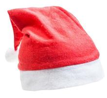 traditional red santa hat isolated on white photo