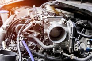 Close up old throttle Body of car in engine room with dust and Soot for repair and clean in process dark photo concept