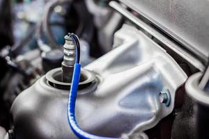 Close up Oxygen or intake sensor in engine room part of automobile concept photo