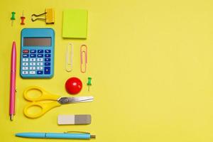 Creative and trendy, school or office workspace with colored supplies photo