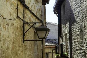 Old lamppost on the street photo