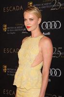 LOS ANGELES - JAN 14 - Charlize Theron arrives at the BAFTA Award Season Tea Party 2012 at Four Seaons Hotel on January 14, 2012 in Beverly Hills, CA photo
