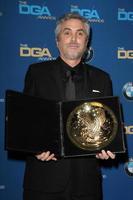 LOS ANGELES - JAN 25 - Alfonso Cuaron at the 66th Annual Directors Guild of America Awards - Press Room at Century Plaza Hotel on January 25, 2014 in Century City, CA photo