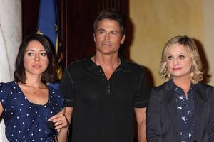 LOS ANGELES - OCT 16 - Aubrey Plaza, Rob Lowe, Amy Poehler at the Parks And Recreation 100th Episode Celebration at CBS Studios - Radford on October 16, 2013 in Studio CIty, CA photo