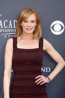 LAS VEGAS - APR 3 - Marg Helgenberger arriving at the Academy of Country Music Awards 2011 at MGM Grand Garden Arena on April 3, 2010 in Las Vegas, NV photo