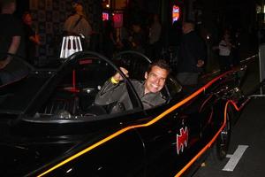 LOS ANGELES - MAR 21 - Antonio Sabato Jr. in the Batmobile at the Batman Product Line Launch at the Meltdown Comics on March 21, 2013 in Los Angeles, CA photo