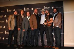 LAS VEGAS - APR 3 - Zac Brown Band and James Taylor in the Press Room at the Academy of Country Music Awards 2011 at MGM Grand Garden Arena on April 3, 2010 in Las Vegas, NV photo