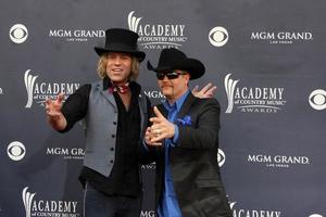 LAS VEGAS - APR 3 - Big and Rich arriving at the Academy of Country Music Awards 2011 at MGM Grand Garden Arena on April 3, 2010 in Las Vegas, NV photo