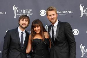 LAS VEGAS - APR 3 - Dave Haywood, Hillary Scott and ,Charles Kelley of Lady Antebellum arriving at the Academy of Country Music Awards 2011 at MGM Grand Garden Arena on April 3, 2010 in Las Vegas, NV photo