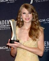 LAS VEGAS - APR 3 - Taylor Swift in the Press Room at the Academy of Country Music Awards 2011 at MGM Grand Garden Arena on April 3, 2010 in Las Vegas, NV photo