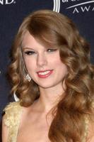 LAS VEGAS - APR 3 - Taylor Swift in the Press Room at the Academy of Country Music Awards 2011 at MGM Grand Garden Arena on April 3, 2010 in Las Vegas, NV photo