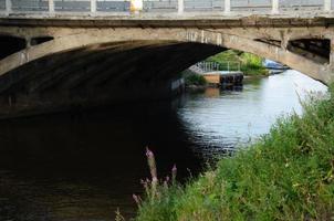 river under a small bridge, bridge construction photo