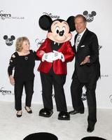 LOS ANGELES - OCT 6 - Sharon Baird, Bob Burgess, Original Mouseketeers, with Mickey Mouse at the Mickey s 90th Spectacular Taping at the Shrine Auditorium on October 6, 2018 in Los Angeles, CA photo