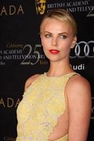 LOS ANGELES - JAN 14 - Charlize Theron arrives at the BAFTA Award Season Tea Party 2012 at Four Seaons Hotel on January 14, 2012 in Beverly Hills, CA photo