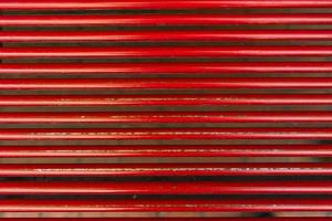 the wall is red stripes background photo