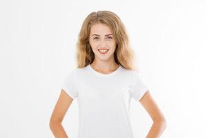 Young caucasian blonde girl isolated on white background. Copy space. Mock up. Summer woman clothes blank template white t shirt. Perfect skin. Skincare and makeup concept. photo