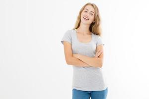 Young blonde woman with fit slim body in blank template t shirt and jeans isolated on white background. Skin and hair care. Copy space and mock up photo