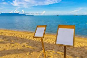 Town signs road information board directional signs on beach Thailand. photo