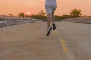 man with runner on the street be running for exercise. photo