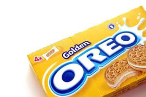 TERNOPIL, UKRAINE - MAY 28, 2022 Oreo golden crispy cookie box. The brand Oreo is owned by company Mondelez international photo