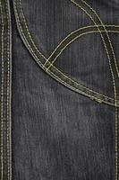 The texture of black denim cloth photo