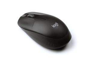 KHARKIV, UKRAINE - MARCH 5, 2021 Logitech wireless mouse on white background. Logitech is a Swiss multinational manufacturer of computer peripherals photo