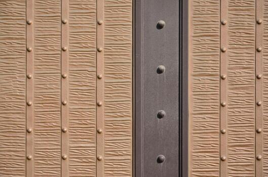 The texture of the fragment of the ancient bronze gate photo