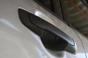 Close up black car door handle. Car equipment photo