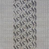 A pattern made of white bricks in the form of diamond shapes. Decoration of the walls during the Soviet Union photo