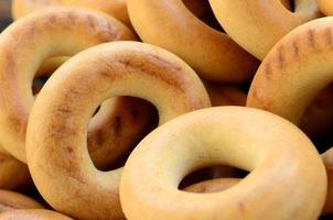 Close-up photo of fresh yellow bagels. A popular kind of flour products. One of the traditional Russian treats for tea