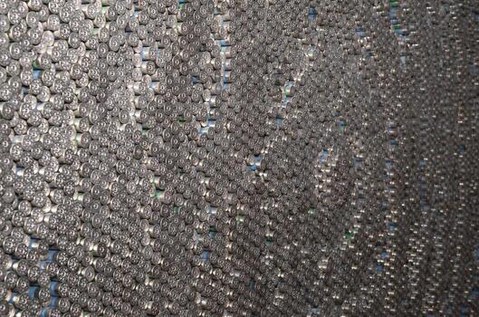 Pattern of 12 gauge cartridges for shotgun bullets. Shells for hunting rifle close up. Backdrop for shooting range or ammunition trade concepts photo