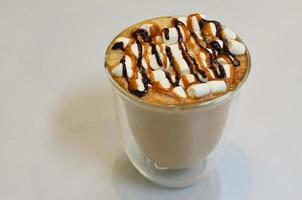 Fresh cappuccino with zephyr topping photo